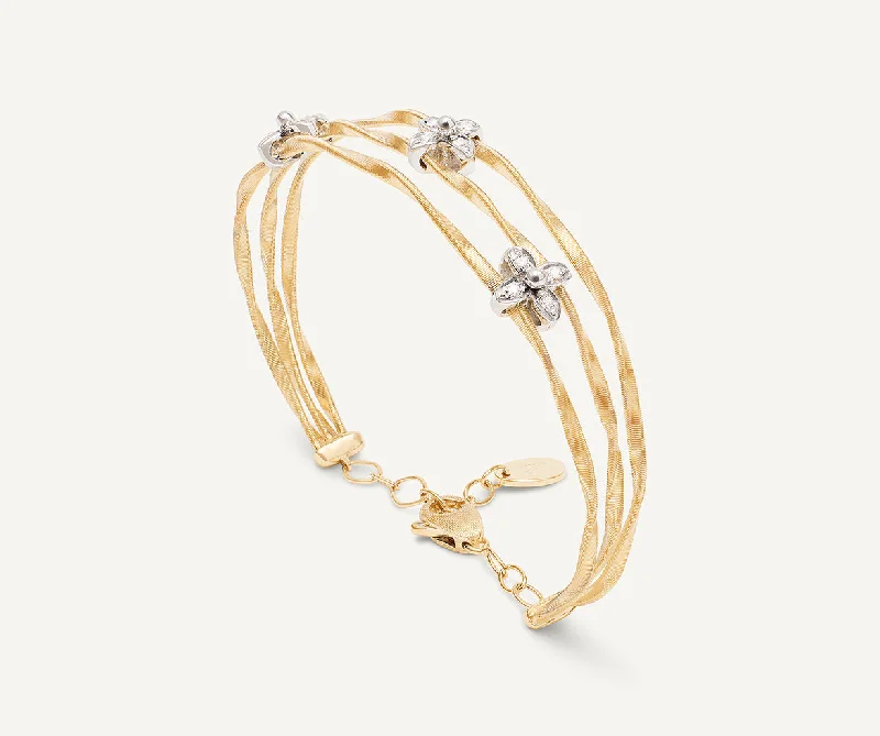 18K Yellow Gold 3-Strand Bangle with Floral Diamonds